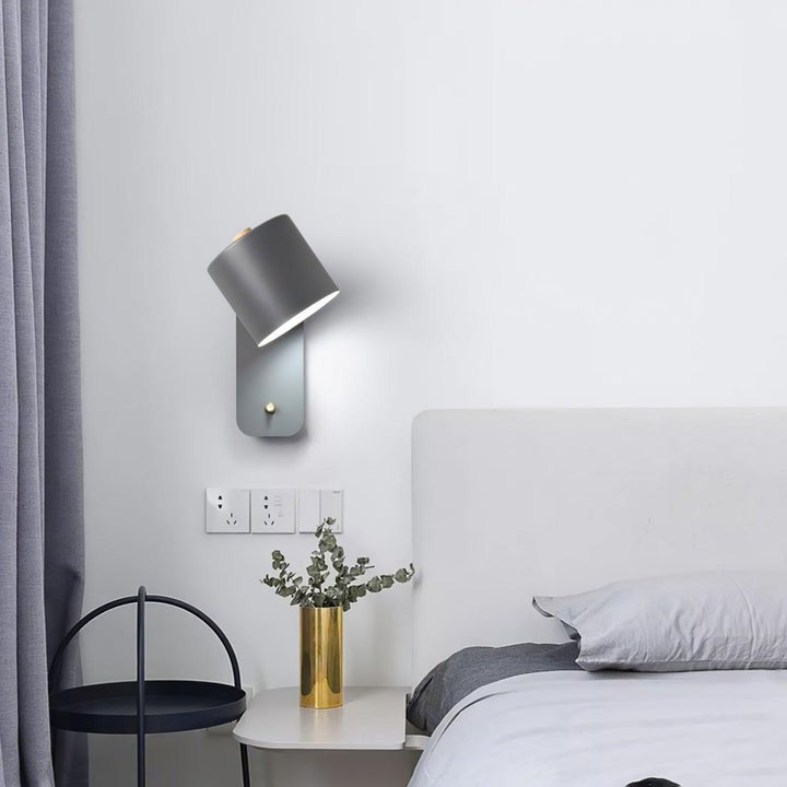 Adjustable Rotating Cylinder Plug-In Wall Sconce