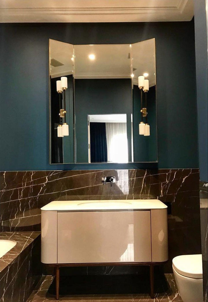 Asymmetric 4-Light Brass Wall Sconce