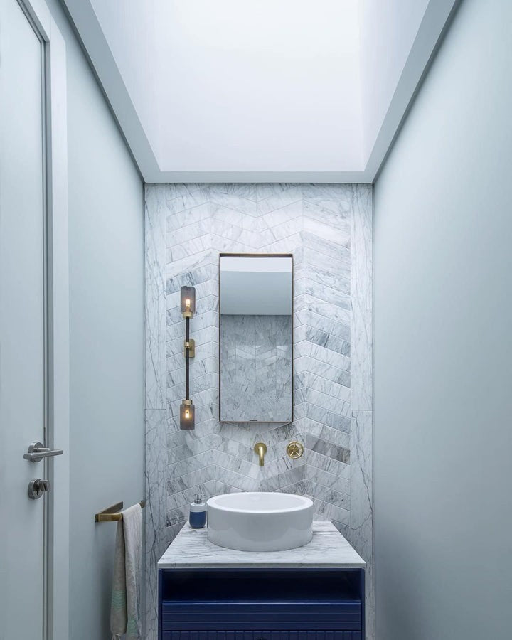 Asymmetric 4-Light Brass Wall Sconce