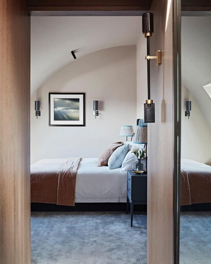 Asymmetric 4-Light Brass Wall Sconce