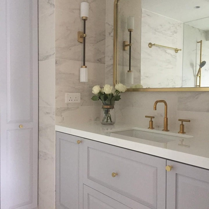 Asymmetric 4-Light Brass Wall Sconce