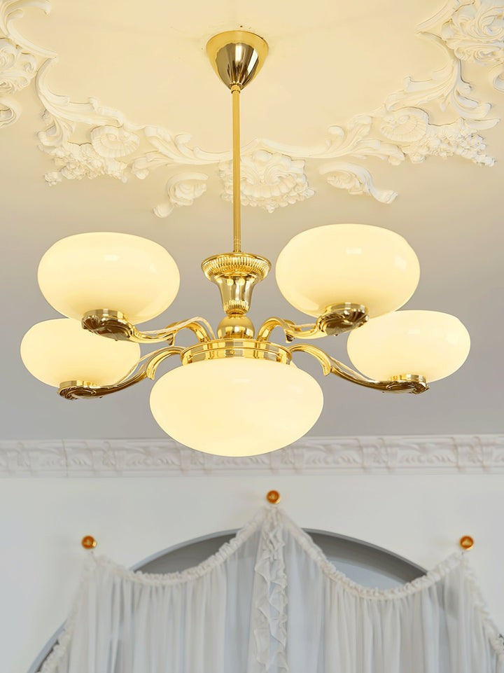 Brass Orb Chandelier with Beige Glass Shades