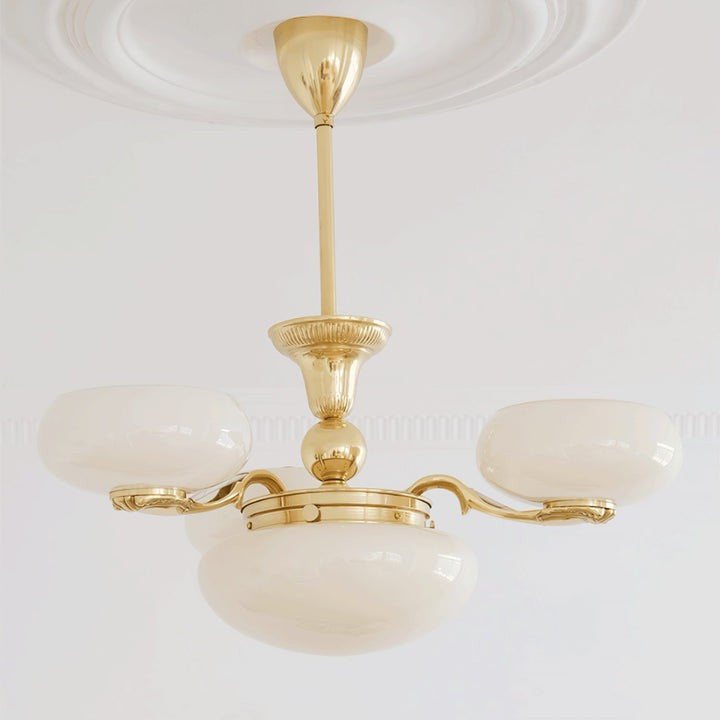 Brass Orb Chandelier with Beige Glass Shades