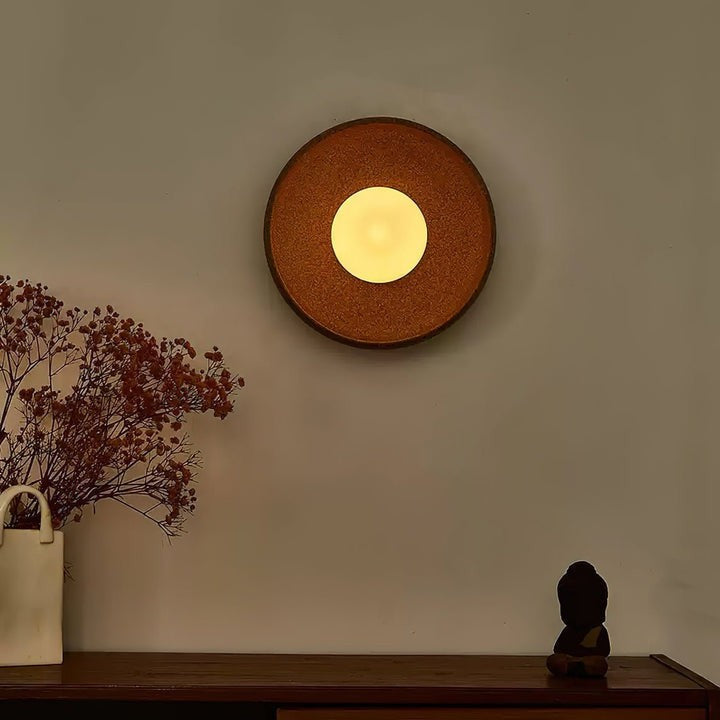 Brown Ceramic Round Wall Sconce with White Glass Globe