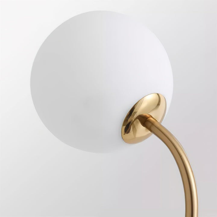 Flamingo-Inspired Gold Floor Lamp with Glass Orb