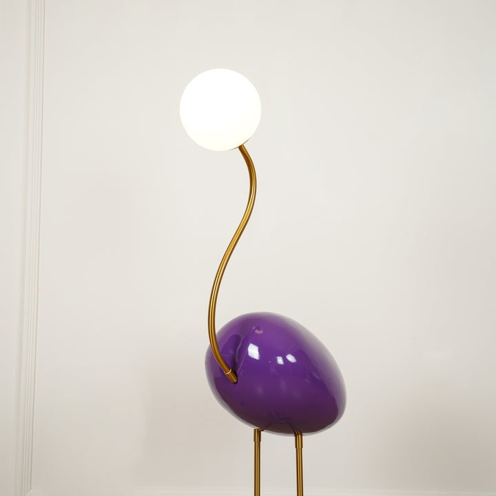Flamingo-Inspired Gold Floor Lamp with Glass Orb