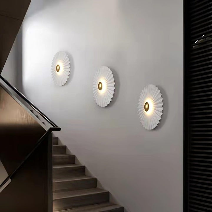 Glossy White & Gold Pleated Ceramic Wall Sconce with Integrated LED