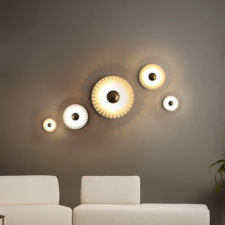 Glossy White & Gold Pleated Ceramic Wall Sconce with Integrated LED