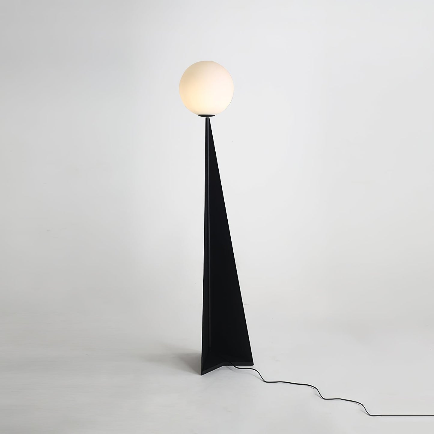 Glowing Sphere Floor Lamp with Sleek Tapered Metal Base