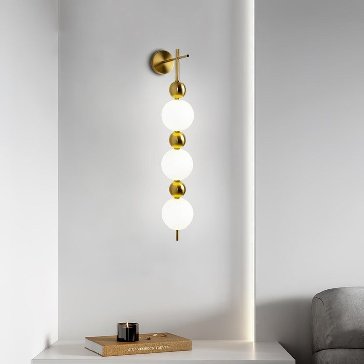 Gold Acrylic LED Wall Sconce with String Design