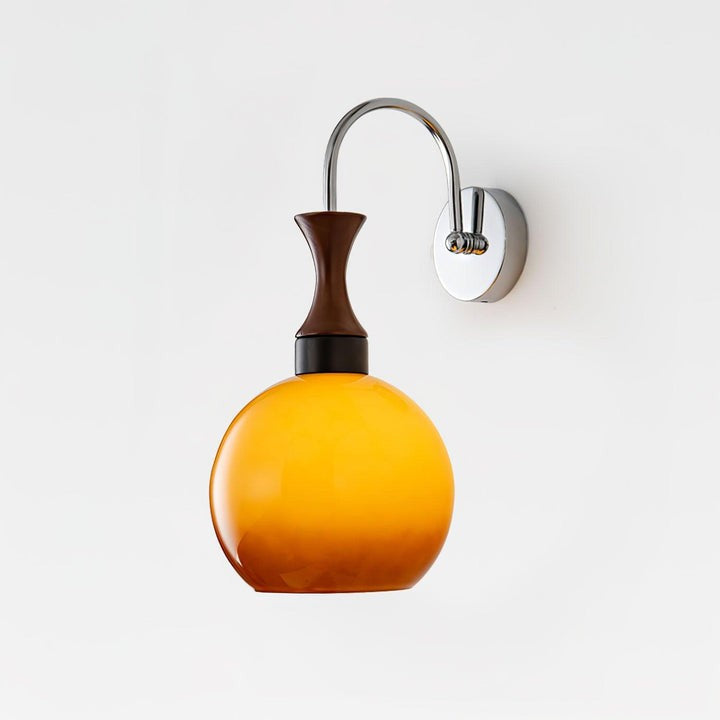 Golden Globe Wall Sconce with Sleek Metal Arm