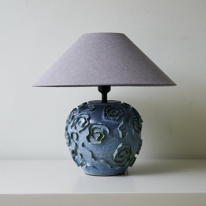 Indigo Ceramic Floral Table Lamp with Gray Linen Shade