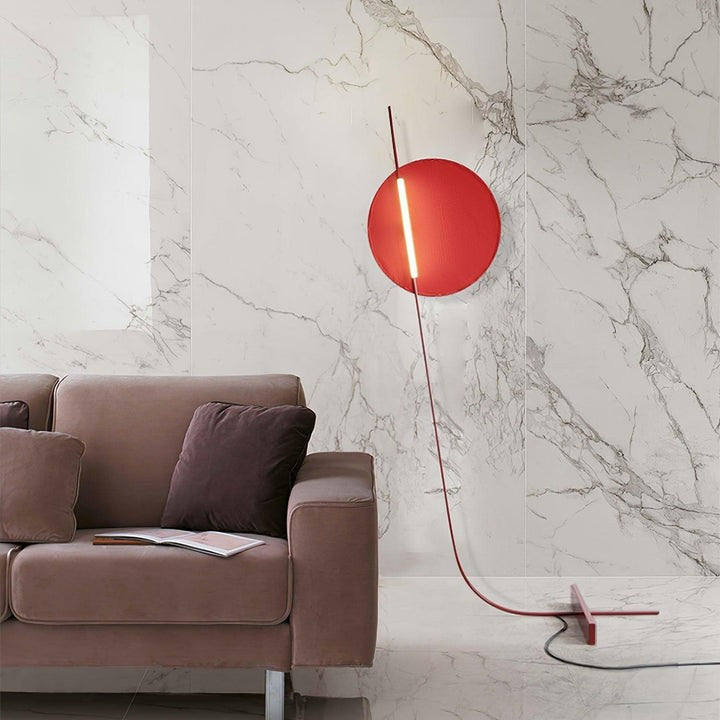 Motion-Inspired LED Floor Lamp with Sculptural Metal Frame