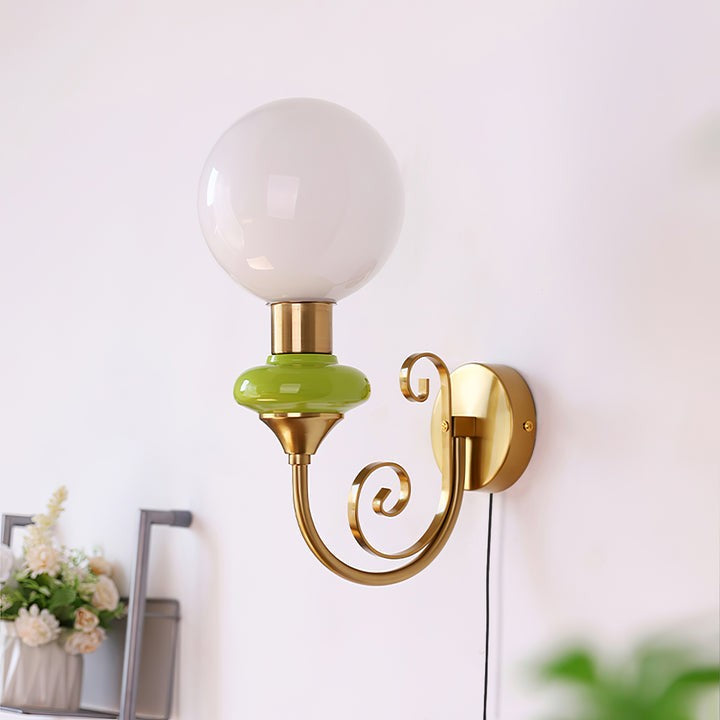 Plug-in Wall Sconce with Green Glass Shade and Gold Accents