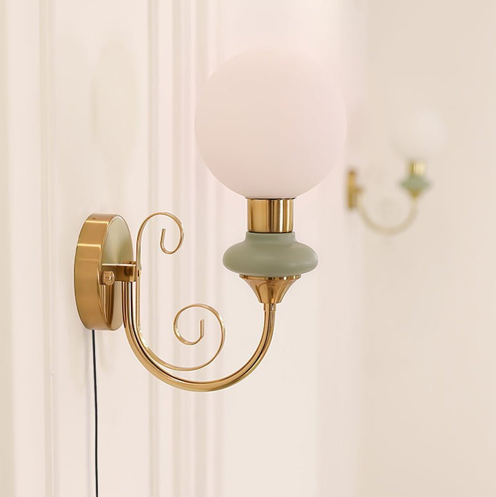 Plug-in Wall Sconce with Green Glass Shade and Gold Accents