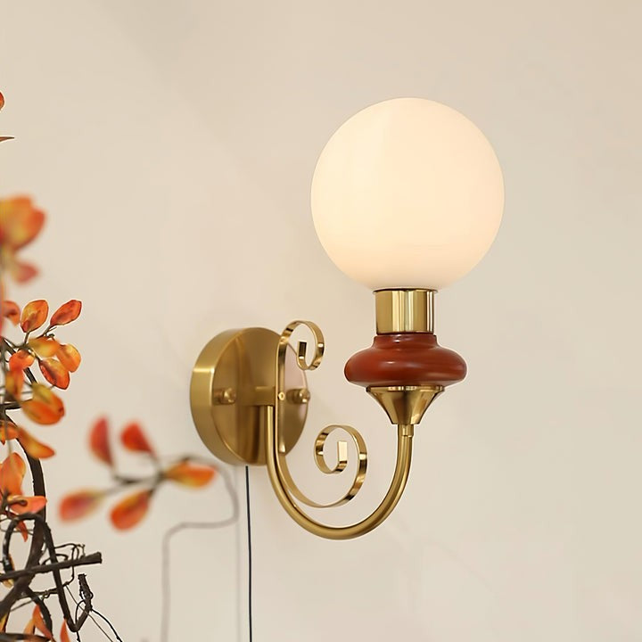 Plug-in Wall Sconce with Green Glass Shade and Gold Accents