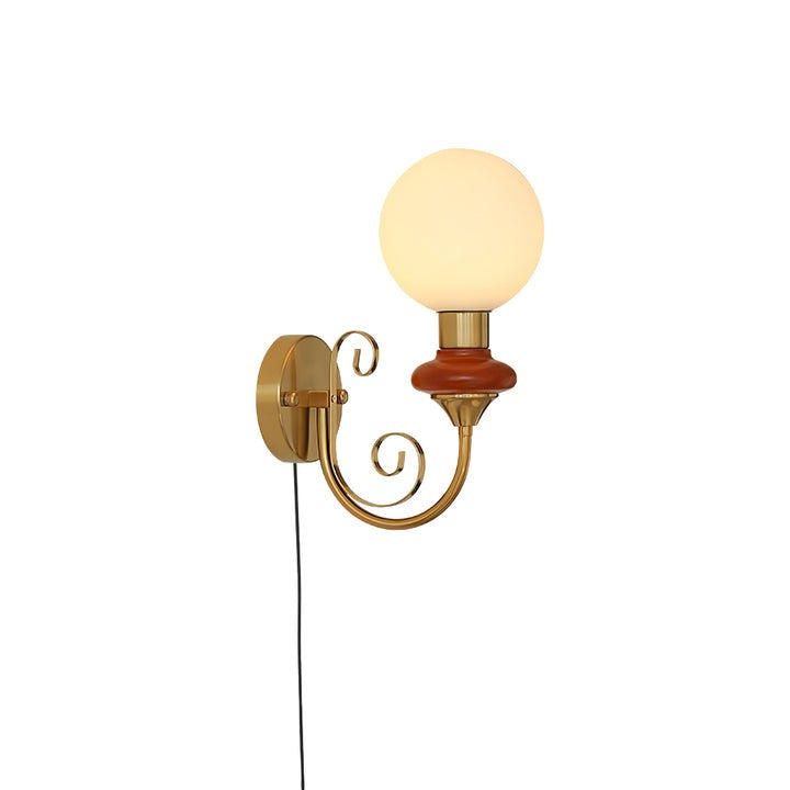 Plug-in Wall Sconce with Green Glass Shade and Gold Accents