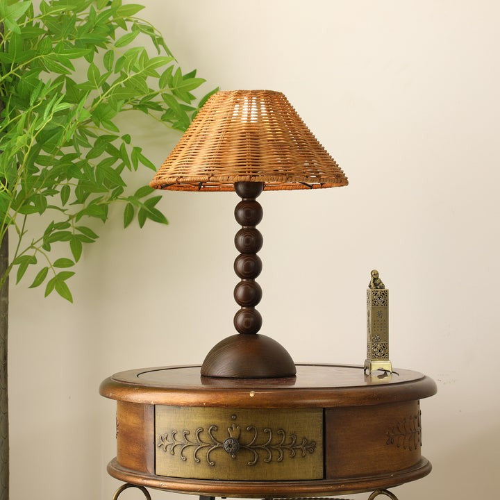 Wooden Table Lamp with Spherical Accents and Rattan Shade