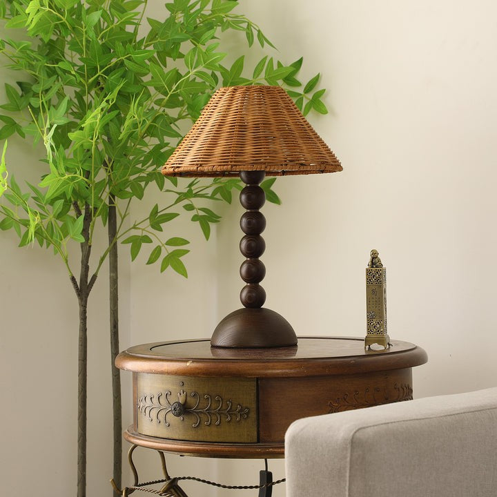 Wooden Table Lamp with Spherical Accents and Rattan Shade