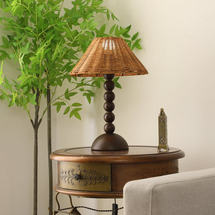 Wooden Table Lamp with Spherical Accents and Rattan Shade