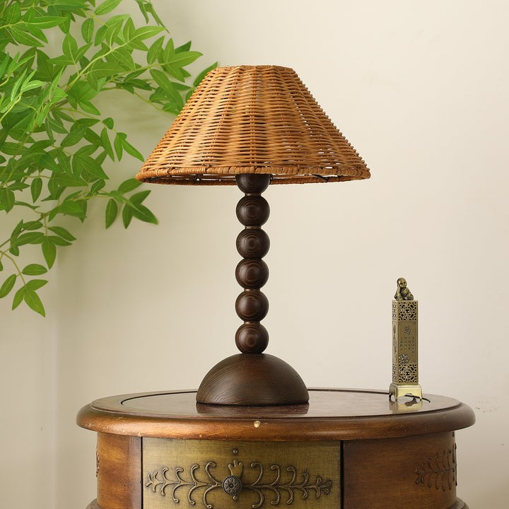 Wooden Table Lamp with Spherical Accents and Rattan Shade