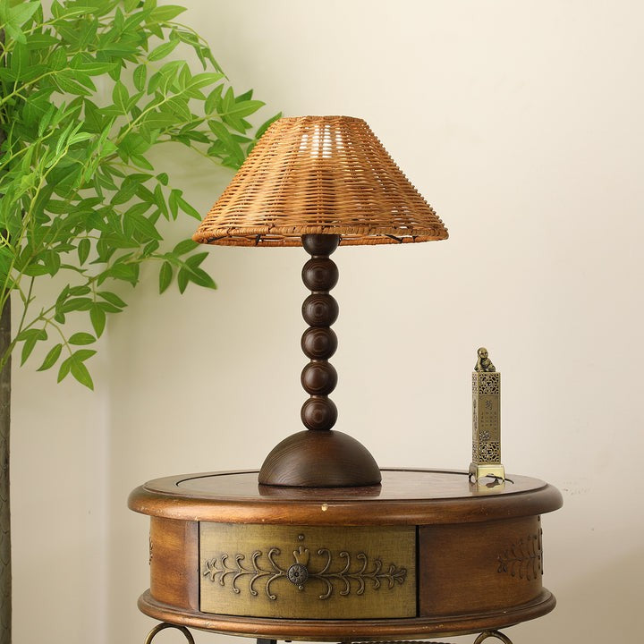 Wooden Table Lamp with Spherical Accents and Rattan Shade