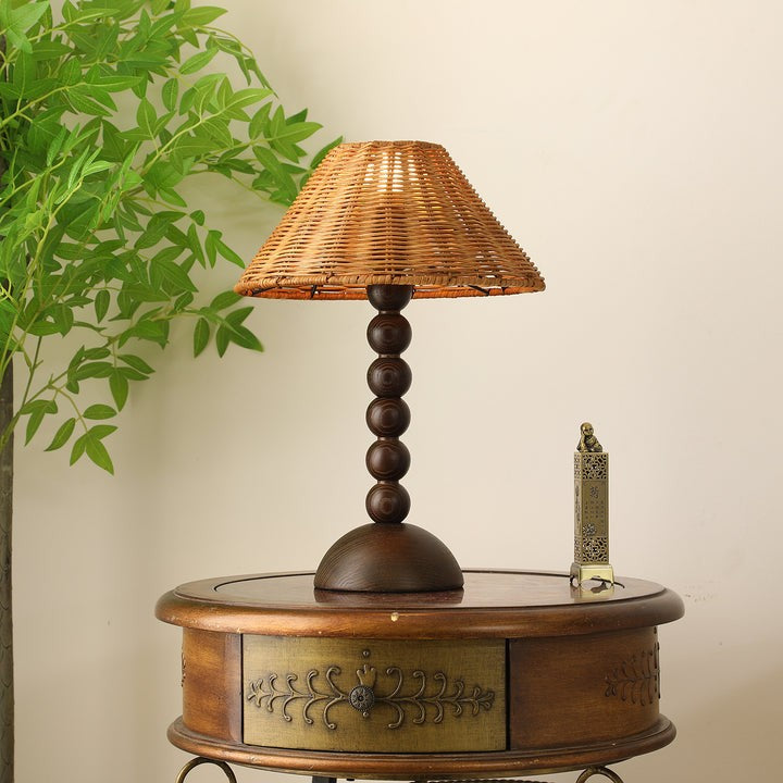 Wooden Table Lamp with Spherical Accents and Rattan Shade