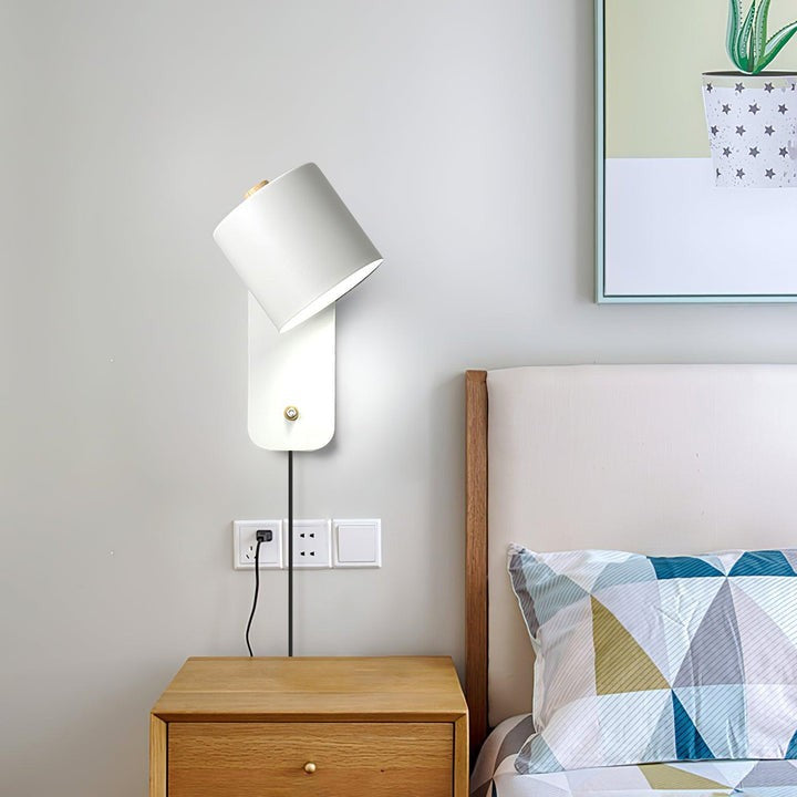 Adjustable Rotating Cylinder Plug-In Wall Sconce