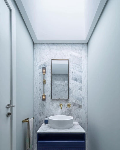 Asymmetric 4-Light Brass Wall Sconce