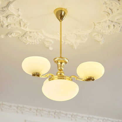 Brass Orb Chandelier with Beige Glass Shades