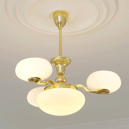 Brass Orb Chandelier with Beige Glass Shades