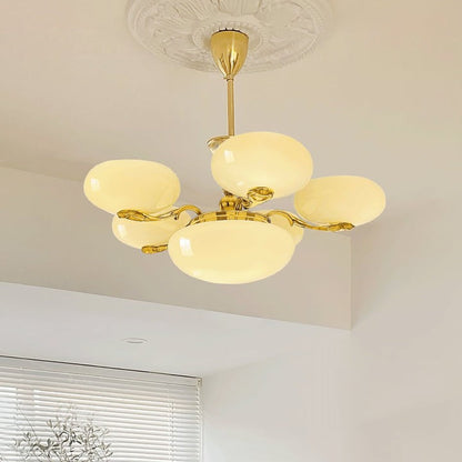 Brass Orb Chandelier with Beige Glass Shades
