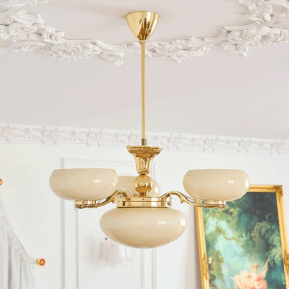 Brass Orb Chandelier with Beige Glass Shades