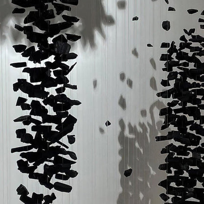 Charcoal-Inspired Linear LED Chandelier