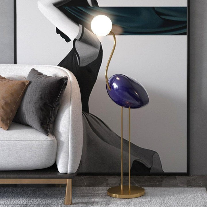 Flamingo-Inspired Gold Floor Lamp with Glass Orb