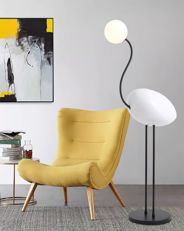 Flamingo-Inspired Gold Floor Lamp with Glass Orb
