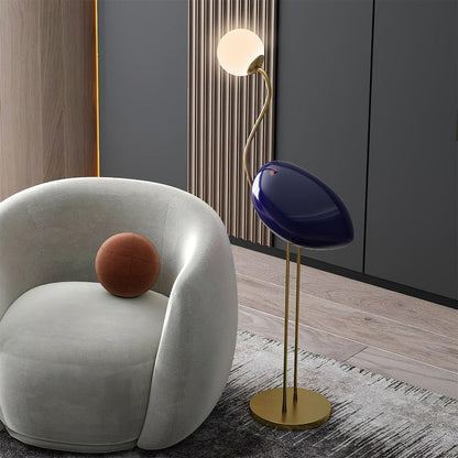 Flamingo-Inspired Gold Floor Lamp with Glass Orb