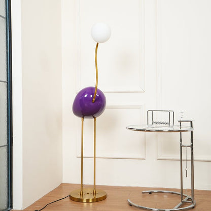 Flamingo-Inspired Gold Floor Lamp with Glass Orb