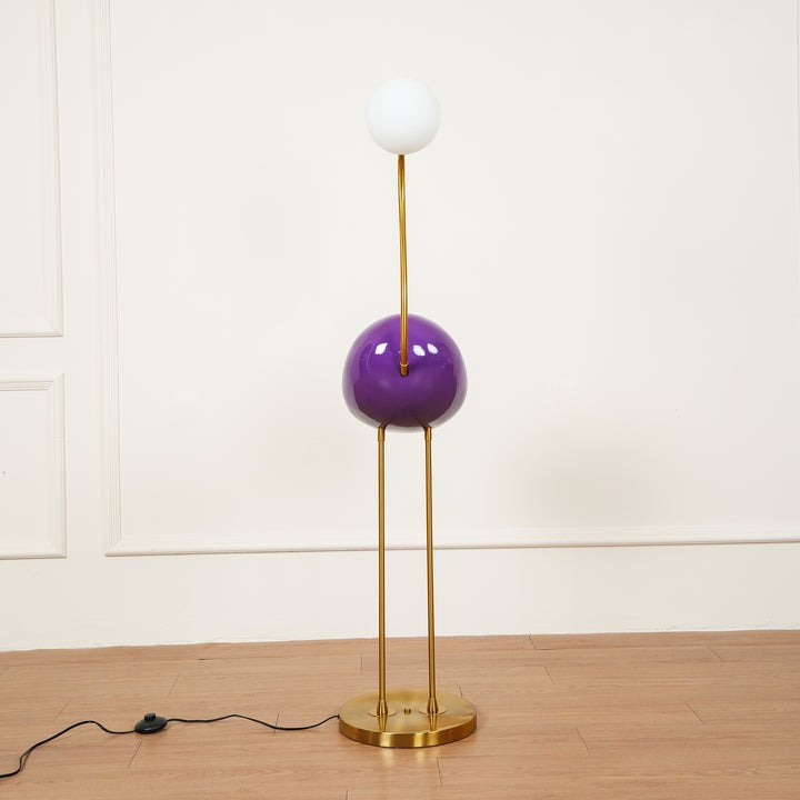 Flamingo-Inspired Gold Floor Lamp with Glass Orb
