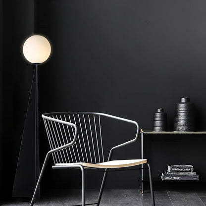 Glowing Sphere Floor Lamp with Sleek Tapered Metal Base