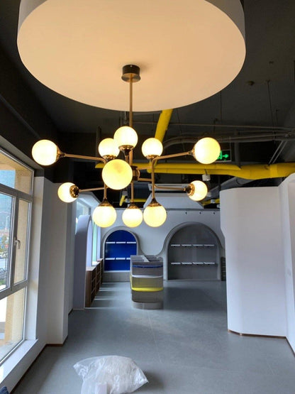 Mid-Century Asymmetrical Brass Chandelier with Glass Globes
