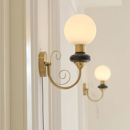 Plug-in Wall Sconce with Green Glass Shade and Gold Accents