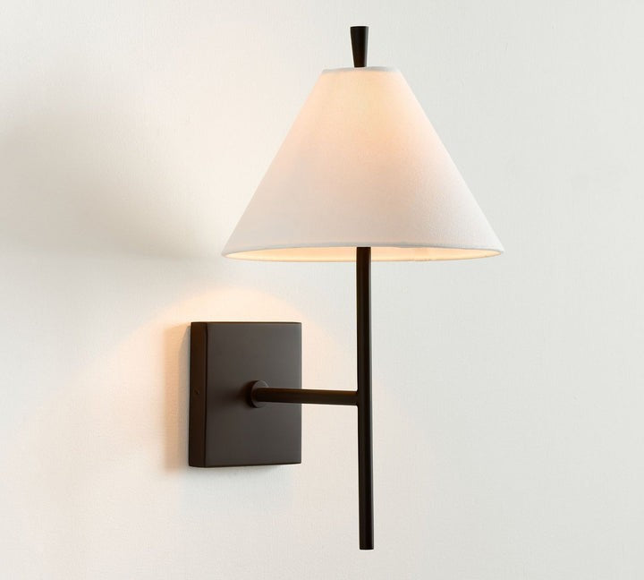 Sleek Brass Wall Sconce with White Shade & Ambient LED Lighting
