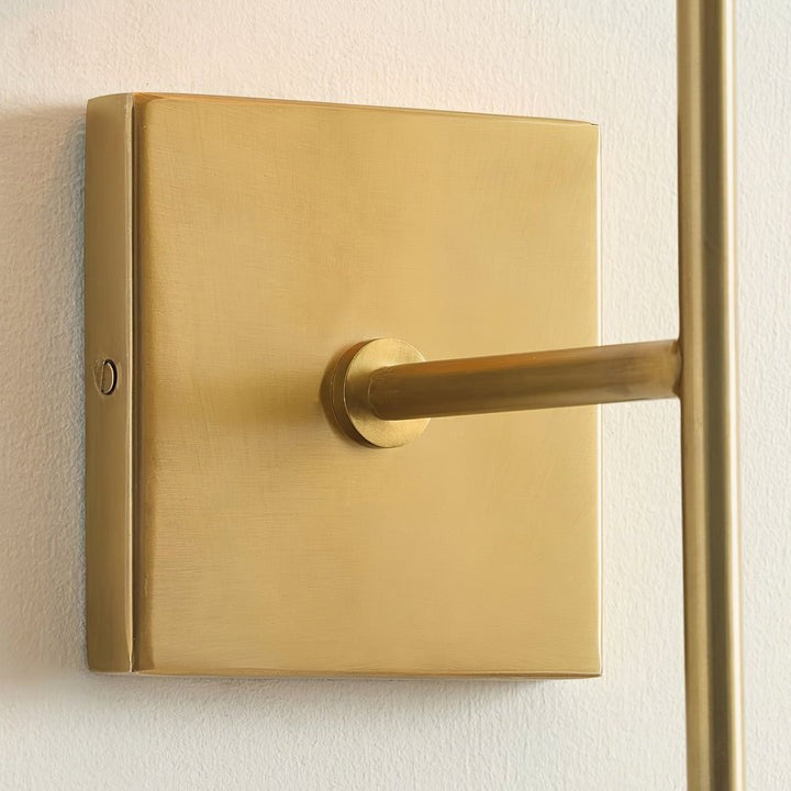 Sleek Brass Wall Sconce with White Shade & Ambient LED Lighting