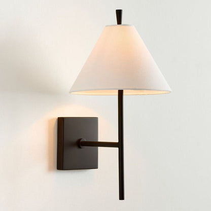 Sleek Brass Wall Sconce with White Shade & Ambient LED Lighting