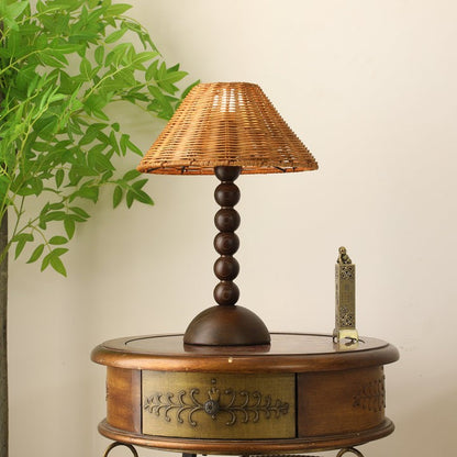 Wooden Table Lamp with Spherical Accents and Rattan Shade