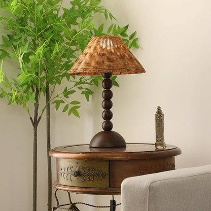 Wooden Table Lamp with Spherical Accents and Rattan Shade