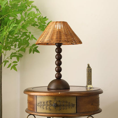 Wooden Table Lamp with Spherical Accents and Rattan Shade